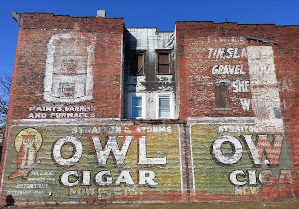 Painted wall advertisement for Owl Cigar