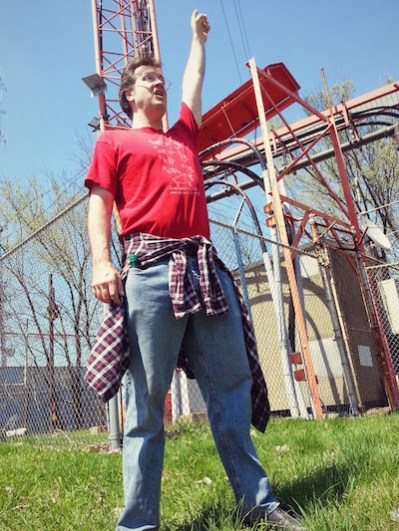 Man celebrating reaching Pittsburgh's highpoint