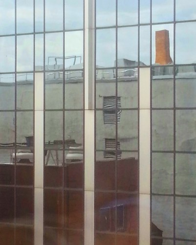 University of Pittsburgh building reflected in glass windows