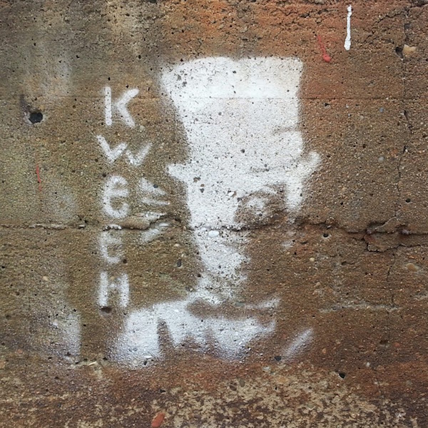 stencil graffiti of man with top hat and the word "kween", Pittsburgh, Pa.