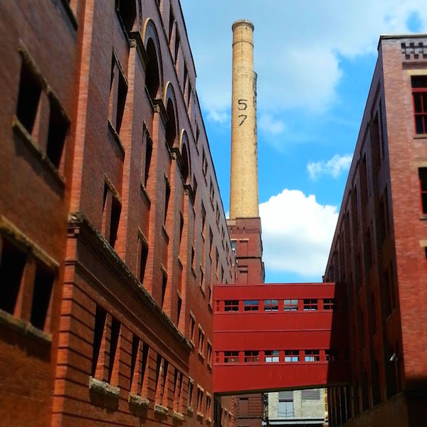 Heinz factory smokestacks with red brick factory buildings
