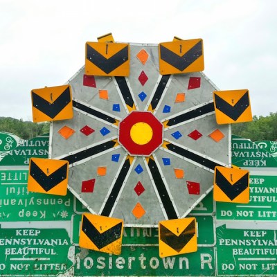 Meadville PennDOT sign sculpture fence of merry-go-round