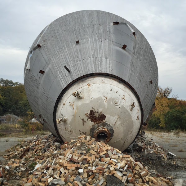 Westinghouse atom smasher on pile of rubble, Forest Hills, PA