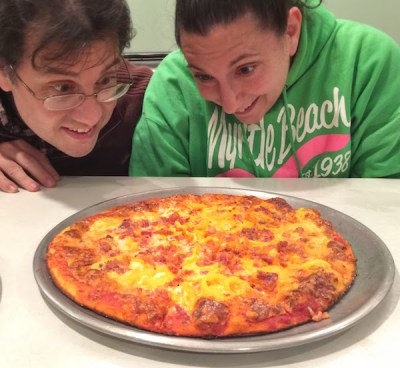 excited diners look with anticipation of their "Birdville Pie"