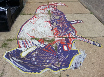sidewalk painting of purple, red, and white buffalo