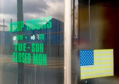 glass storefront windows for former pizza shop, Homestead, PA