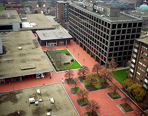 Aerial photo showing Allegheny Center's original open space parklet and red polymer surface