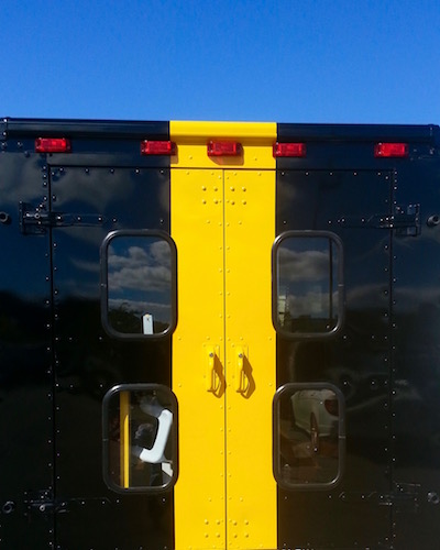 former delivery van now painted in Pittsburgh Steelers black and gold