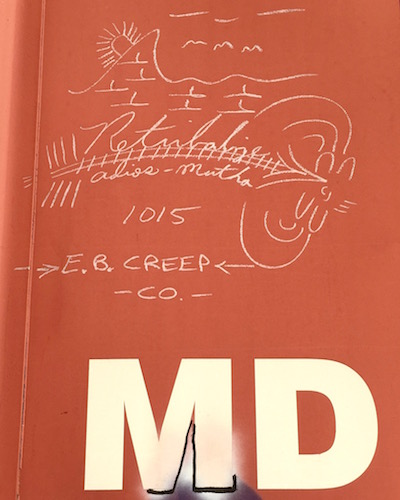 boxcar graffiti of mountain, sunrise, and train tracks with text "Retribalize, adios-mutha 10/5"