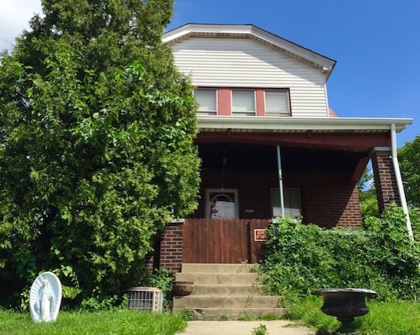 statuette of Mary in front yard of house, Pittsburgh, PA