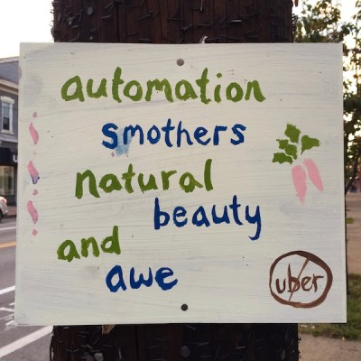 Handmade sign reading "Automation smothers natural beauty and awe", Pittsburgh, PA