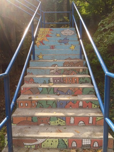 public steps with mosaic decoration including houses, sky, a fox, a bird, sun, and stars, Pittsburgh, PA