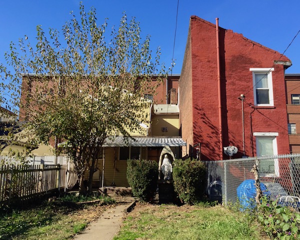 statue of Mary in homemade grotto, Pittsburgh, PA