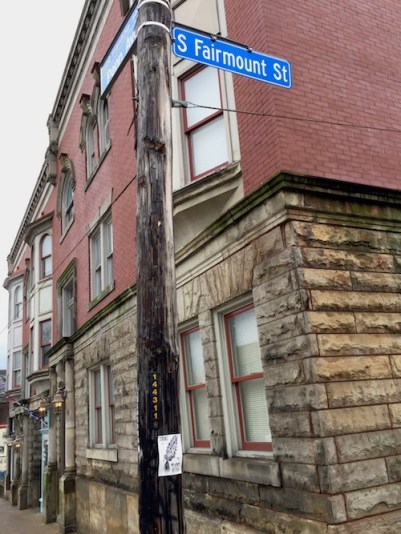 Clarence the Bird artwork stapled to telephone pole, Pittsburgh, PA