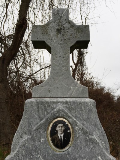 ceramic photograph with image almost completely disappeared on headstone of grave, Loretto Cemetery, Pittsburgh, PA