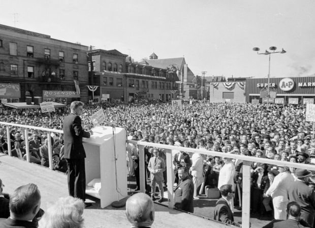 President John F. Kennedy addresses a large outdoor crowd in Monessen, PA, Oct. 13, 1962