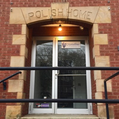 brick building with "Polish Home" engraved in stone over entry doors, Monessen, PA