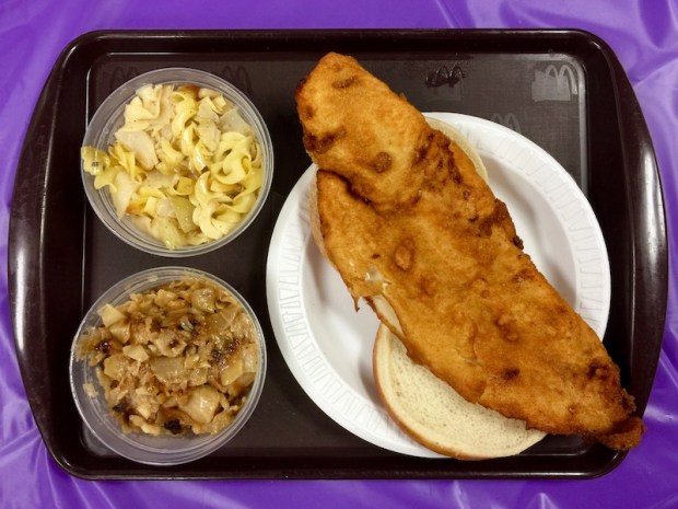 fish sandwich with sides of haluski and potato haluski from church fish fry