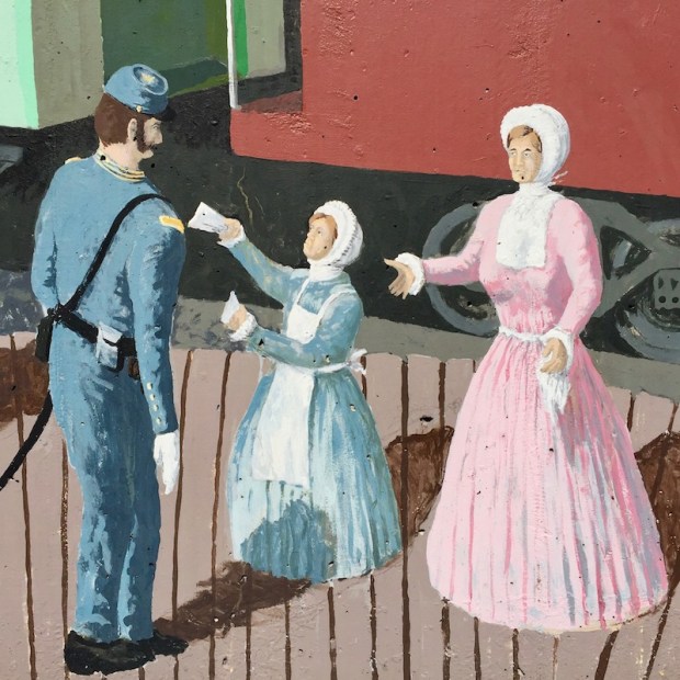 mural detail of Union army soldier with two women in Victorian dress at Tarentum, PA train station