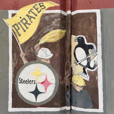 mural detail of Pittsburgh Steelers, Pirates, and Penguins logos, Tarentum, PA