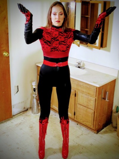 Helena Brent transforms into heroine Hellfyra in the Brillobox bathroom