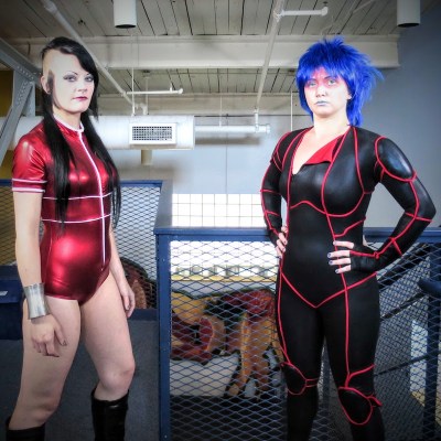 Villainess Red Gina and computer-savvy heroine Cybrina