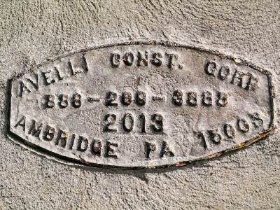 Avelli Construction Corporation sidewalk concrete mason stamp, Pittsburgh, PA
