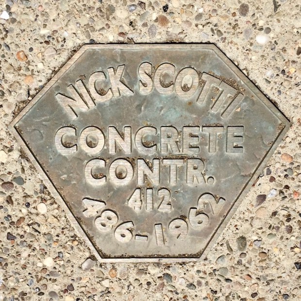 brass sidewalk plaque for Nick Scotti, Concrete Contr., Pittsburgh, PA