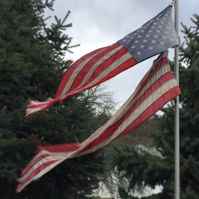 American flag on pole split into two, Pittsburgh, PA