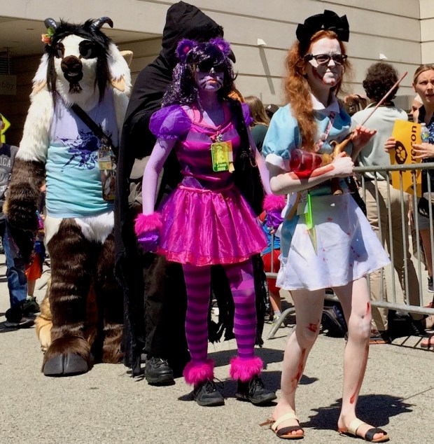 young woman in blood-spattered skirt and blouse, Anthrocon 2017 Fursuit Parade, Pittsburgh, PA