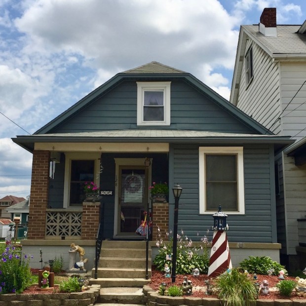 wooden bungalow house with large lighthouse lawn ornament in front, Neville Island, PA
