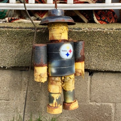 robot ornament made from tin cans, painted black with Steelers logo, New Kensington, PA