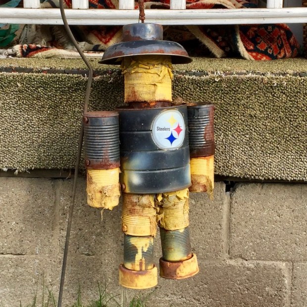 robot ornament made from tin cans, painted black with Steelers logo, New Kensington, PA