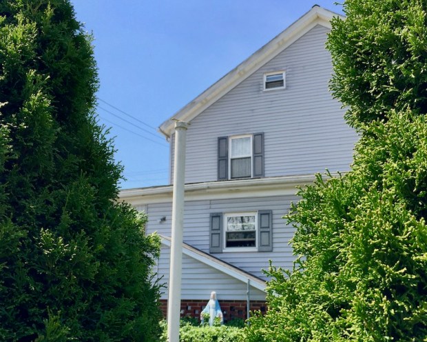 Mary statuette in back yard of house, Monaca, PA