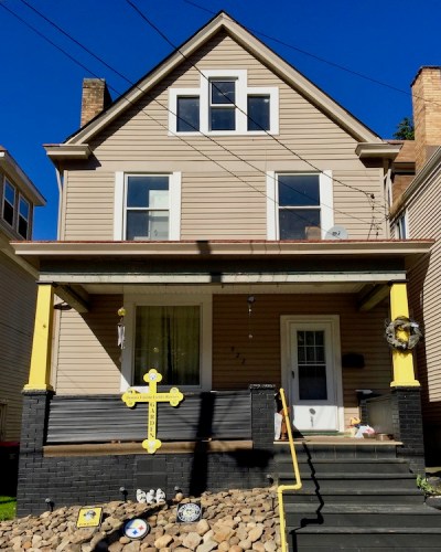 frame house with black-and-gold porch, Beaver Falls, PA