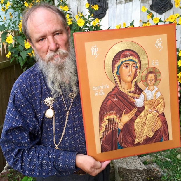 icon painter Simeon Larivonovoff with icon of St. Hodogitria