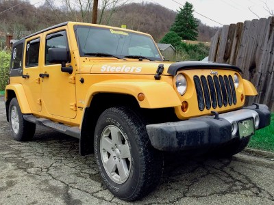 Jeep painted gold with black details and Steelers decals, Hyde Park, PA