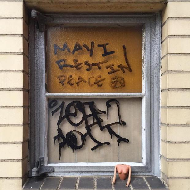 torso from a plastic doll on a window ledge, Pittsburgh, PA