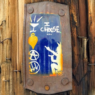 small painting on steel can of devil with the text "I choose...", Pittsburgh, PA