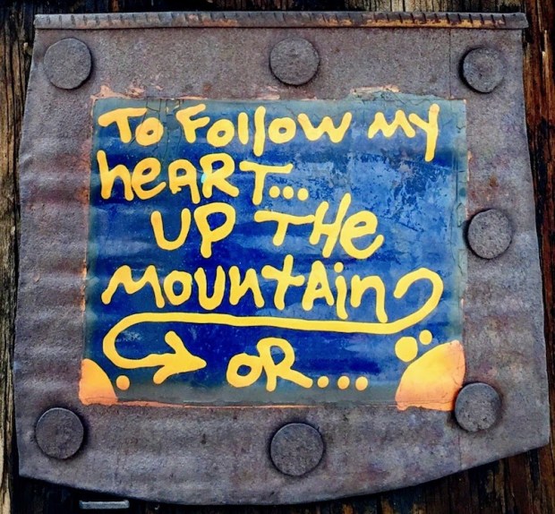 small painting on steel can with text "to follow my heart...up the mountain, or...", Pittsburgh, PA