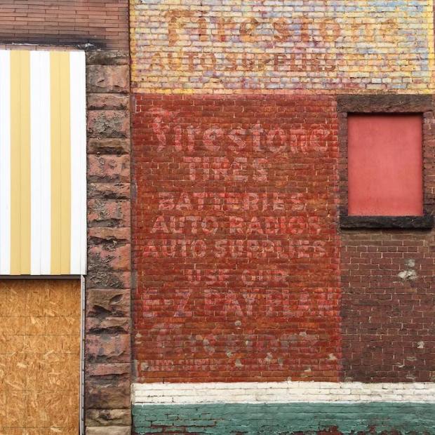alley wall with ghost signs and many materials, Butler, PA