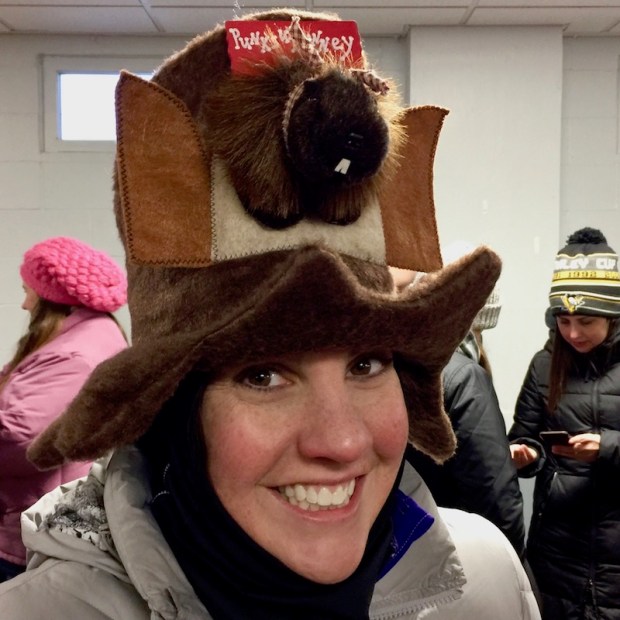 woman with groundhog hat