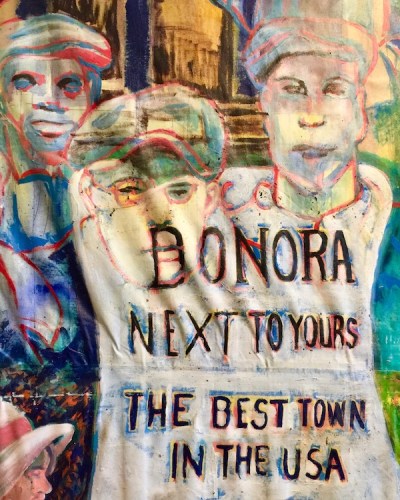 painting of historic sign reading "Donora: next to yours, the best town in the USA", Donora Smog Museum
