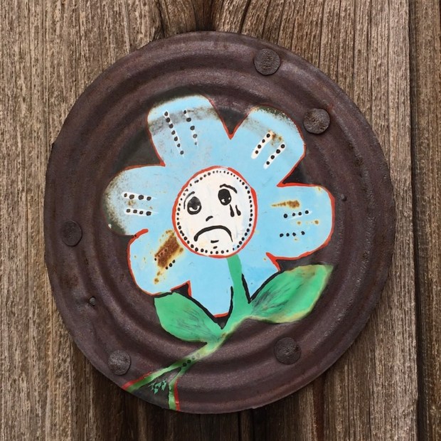 can lid painting of flower with crying face, Pittsburgh, PA
