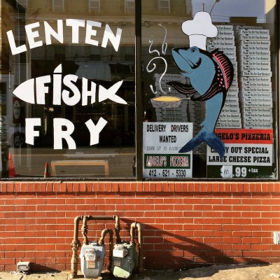 front windows decorated for Lenten Fish Fry, Angelo's Pizza, Pittsburgh, PA