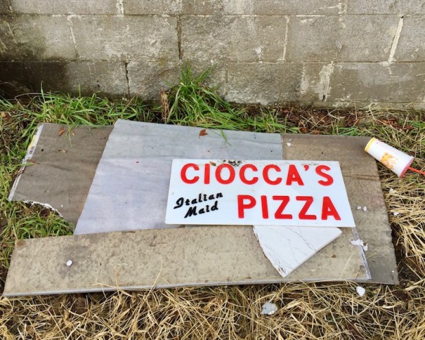 sign for closed pizza shop in alley, Etna, PA