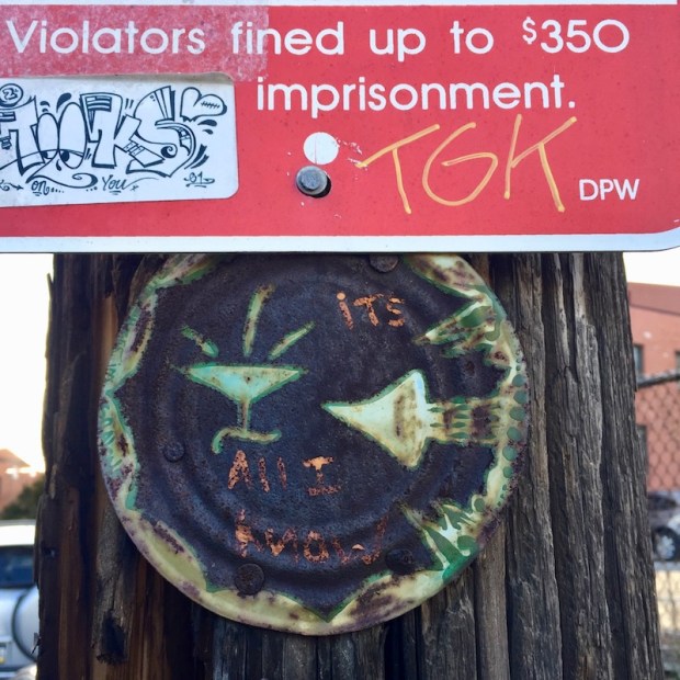 tin can lid painted with the message "It's all I know", Pittsburgh, PA