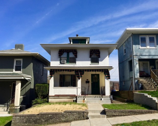several cement houses on a hill in Donora, PA