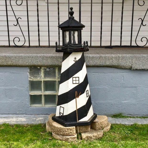 decorative lawn lighthouse against front porch, Neville Island, PA
