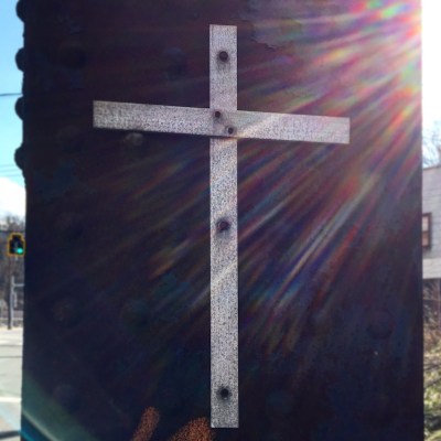 metal cross attached to iron train trestle, Pittsburgh, PA
